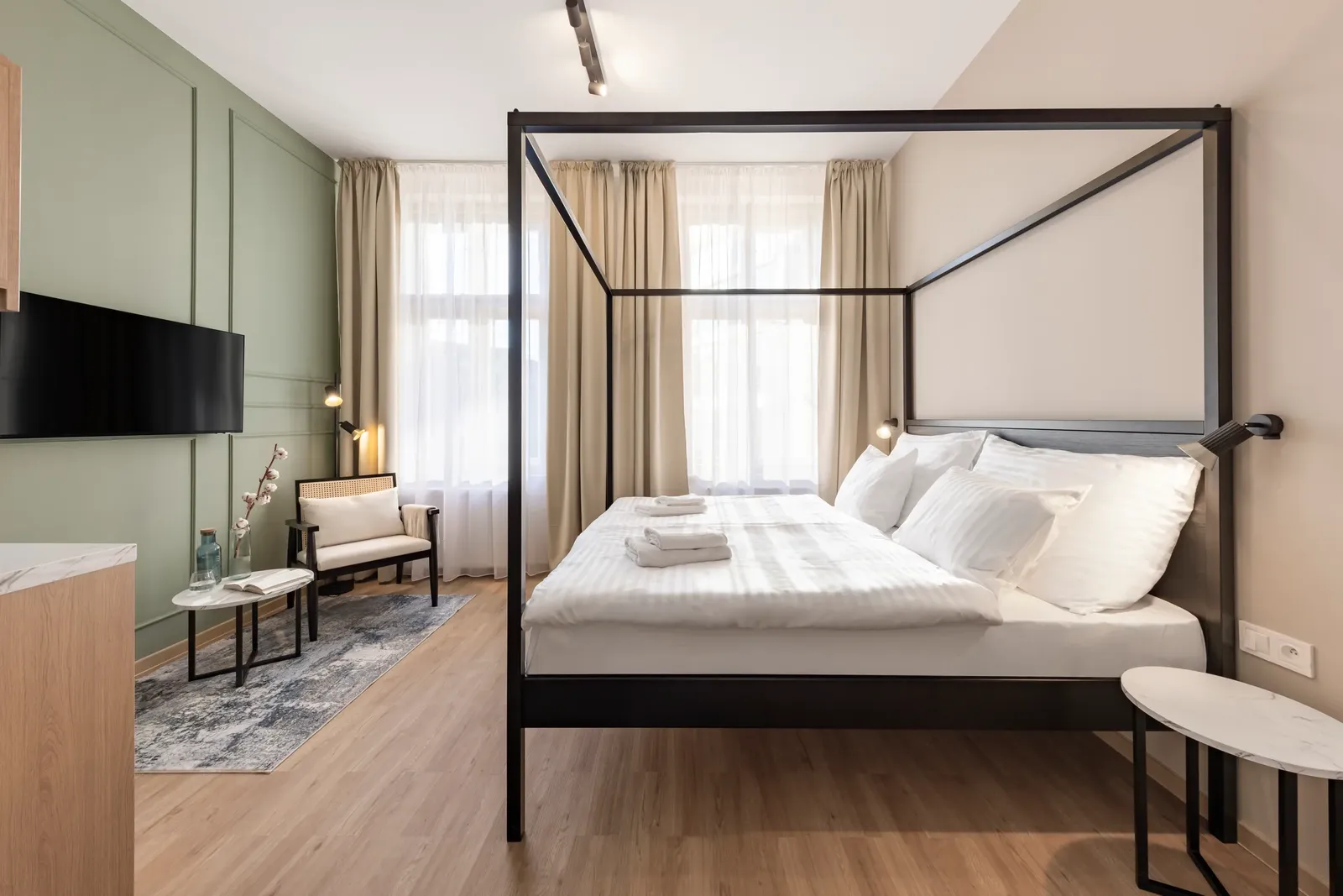 Rodinný apartmán — přestavba bytového domu na hotel v Praze
